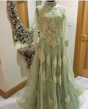 Bridel maxi withdabka nagh perls and threads work color light pistheo green colour on net cloth model#B 21