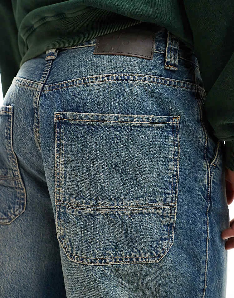 Pull&bear skater fit jean in blue with yellow cast