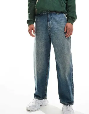 Pull&bear skater fit jean in blue with yellow cast