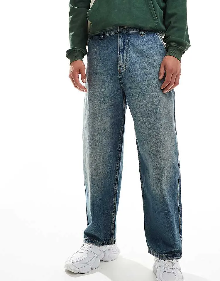 Pull&bear skater fit jean in blue with yellow cast
