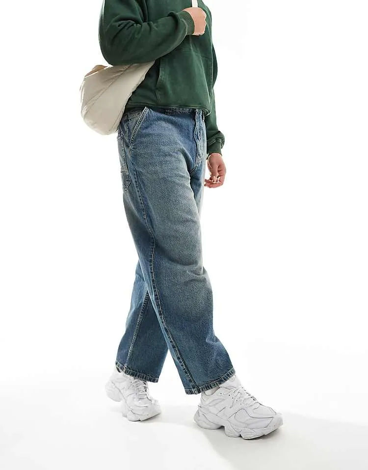 Pull&bear skater fit jean in blue with yellow cast