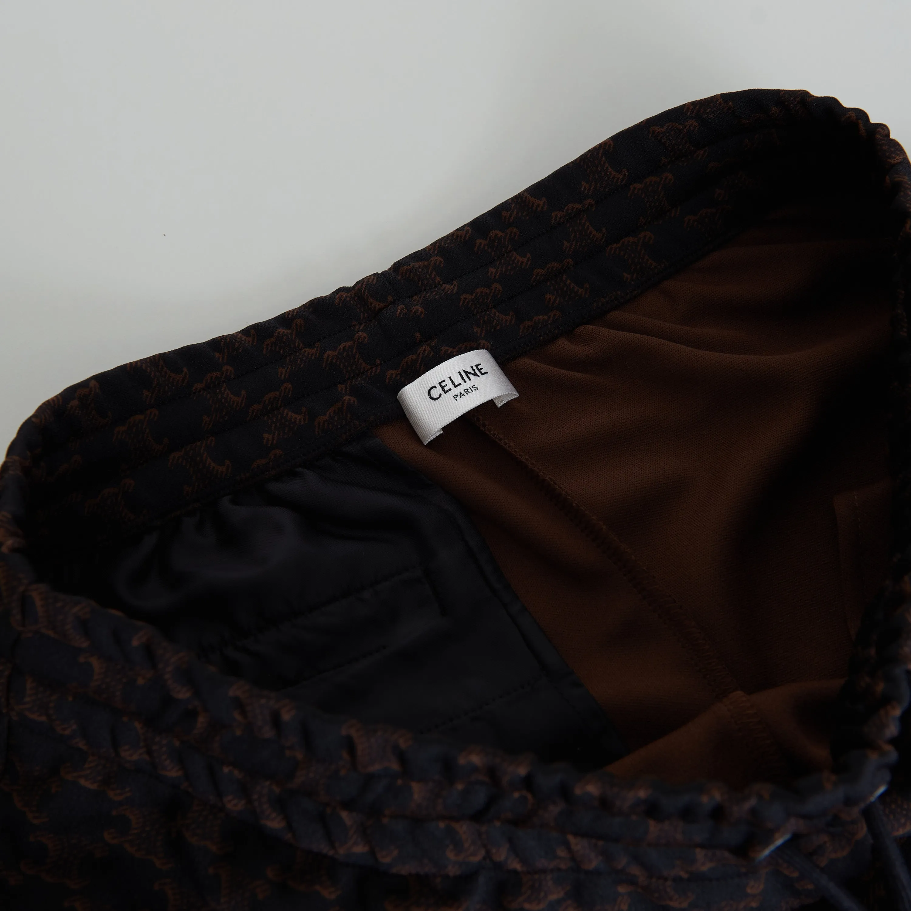 Triomphe Monogram Print Track Pants In Black & Brown Double Face Jersey