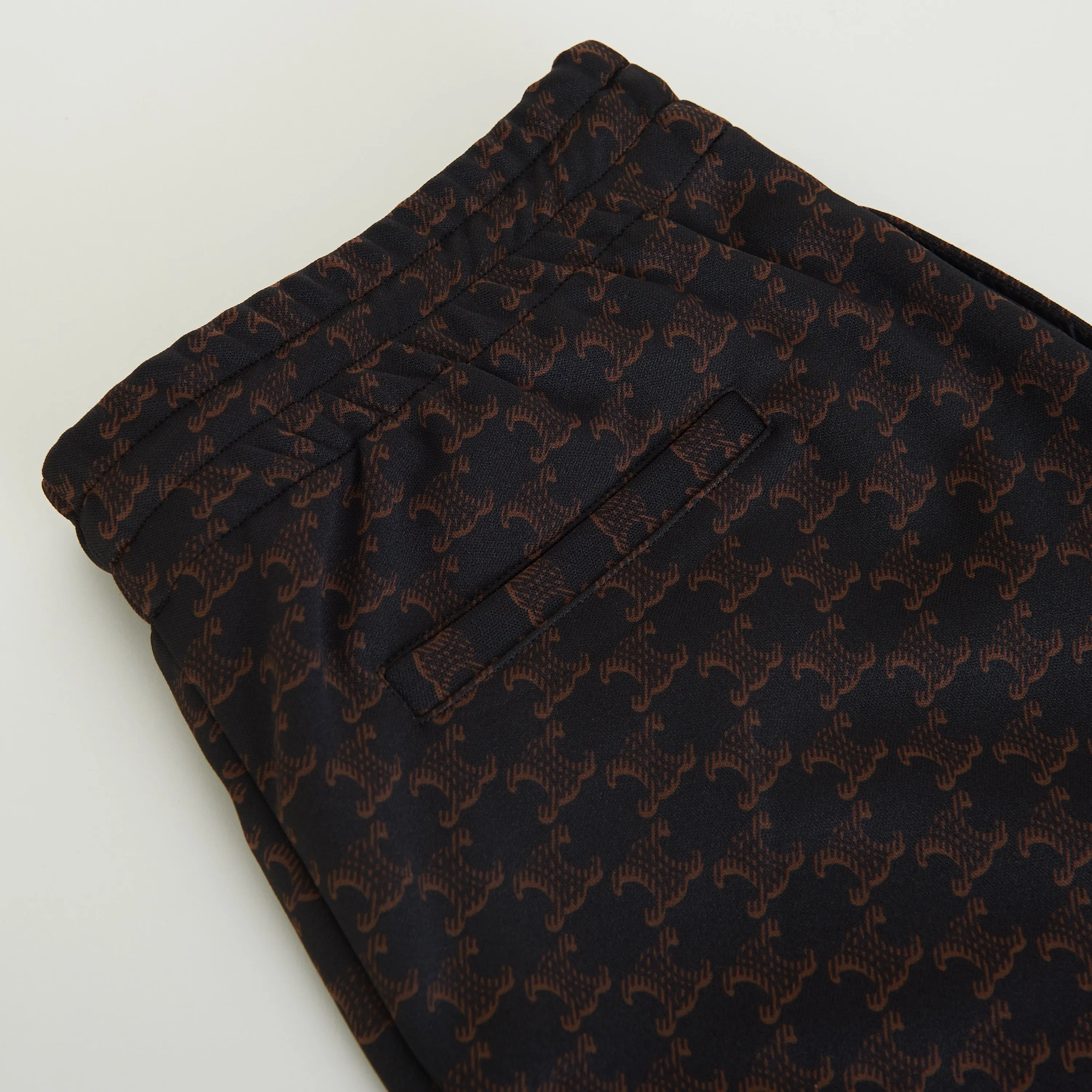Triomphe Monogram Print Track Pants In Black & Brown Double Face Jersey